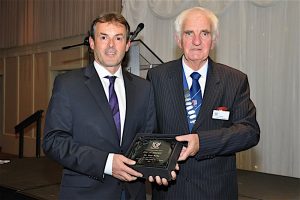 Paul Rellis receives the 2016 Roll of Honour award from CPPU President Gerry MacNamara